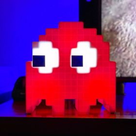 Red lamp in the shape of a Pac-Man ghost