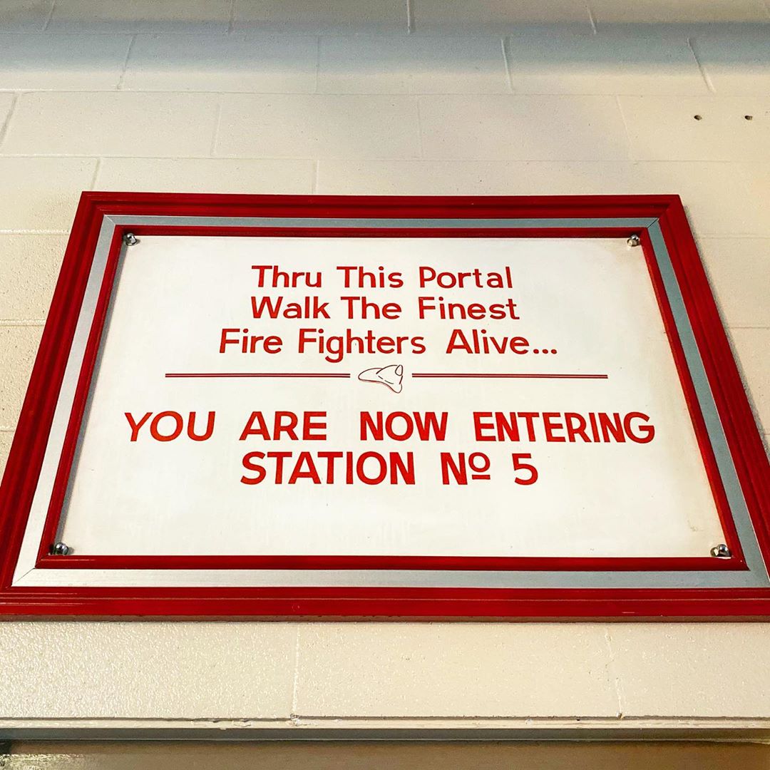 Sign at Elgin Fire Station Number 5 reading, "Thru this portal walk the finest fire fighters alive... You are now entering station number 5"